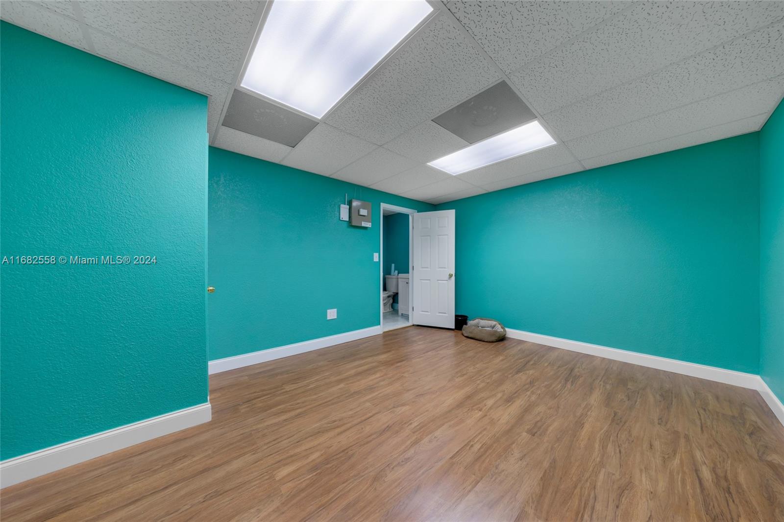 Welcome to 7760 W 20th Ave Unit 7, a versatile condo warehouse offering just over 1,500 square feet of space, ideal for both office and warehouse use. Featuring two bathrooms, an 18-foot clear height, and a convenient street-level door, this property also includes three dedicated parking spots. Originally a warehouse, it has been transformed into functional office space, with the option for the new owner to revert it back to its original purpose. Strategically located in Hialeah Gardens, you'll enjoy easy access to major highways, Miami International Airport, and the Port of Miami, making this an ultimate opportunity for businesses seeking flexibility and convenience.