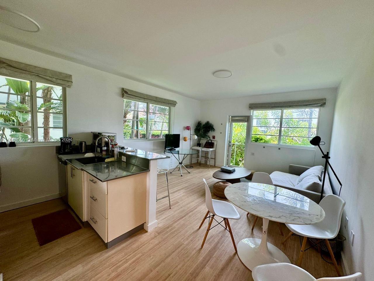 Welcome to The Waterclub Condo. This unit has been tastefully renovated and is flooded with natural light. Unit is amongst the few with a private yard while also offering access to the canal. Property is lined with trees for shade and privacy.