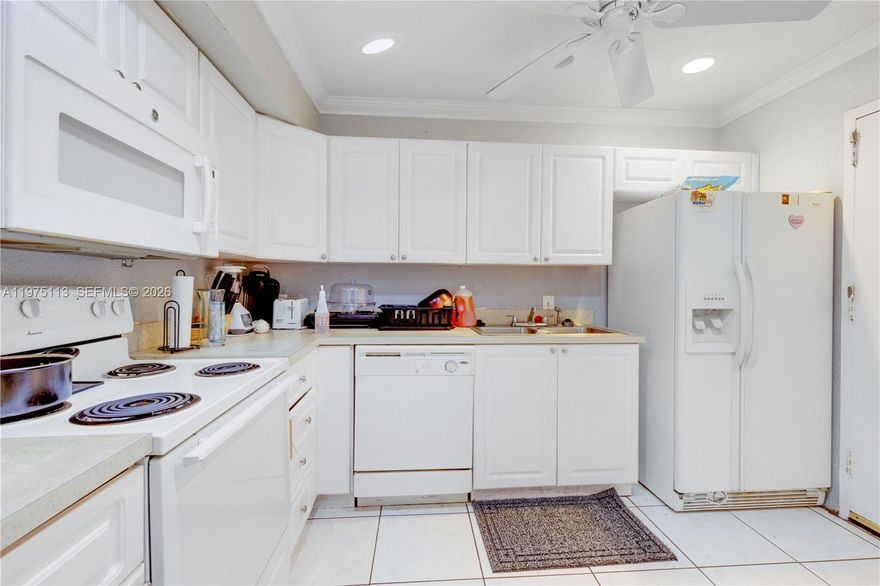 Spacious 2-bedroom, 2-bathroom condo with long-term tenants already in place—an excellent opportunity for investors seeking immediate, reliable rental income. Located in a desirable all-ages community with no age restrictions