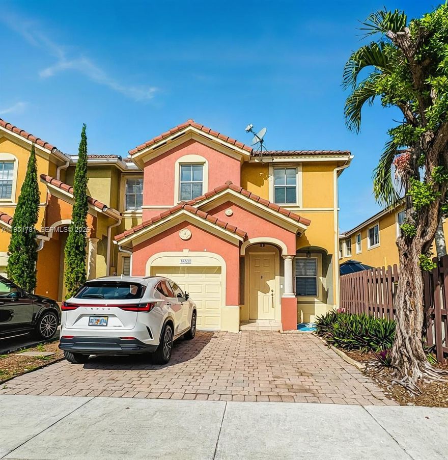 Beautiful & Spacious corner Townhouse – West Kendall.
Step into this elegant 3-bedroom, 2.5-bathroom townhouse with 1,770 sq. ft. of thoughtfully designed living space, where comfort meets style. The huge master bedroom is a private retreat, and all bedrooms feature blackout window treatments for peaceful, restful nights. The master bathroom is fully renovated. The first-floor shines with stylish zebra curtains and tile flooring, while the second-floor features warm laminate throughout. Enjoy an elegant modern kitchen with stainless steel appliances and a cozy breakfast nook, a bright family room perfect for relaxing or entertaining, and a separate dining room ideal for formal meals and special gatherings. Step outside to a fully fenced, paved patio for year-round outdoor enjoyment. Additional highlights include a 1-car garage, two front parking spaces, and plenty of visitor parking spaces. Built in 2006, this home is ideally located near West Kendall Baptist Hospital, shopping, fine dining, top schools, and just 3.5 miles from the Florida Turnpike. Relax and unwind at the sparkling community pool and experience the perfect combination of style, comfort, and convenience. Easy to show—don’t miss the chance to make this your dream home!