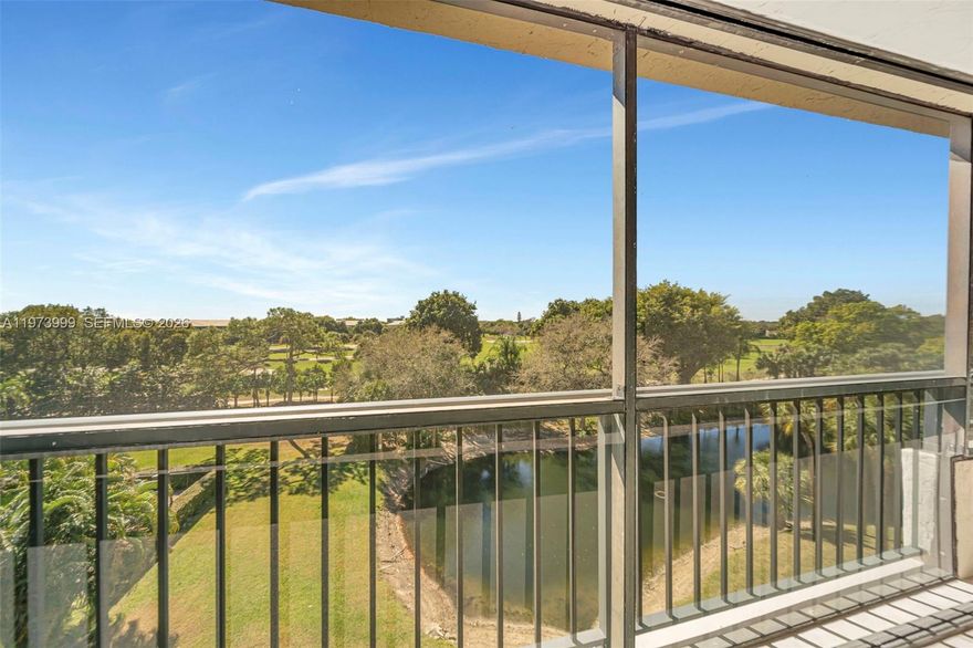 Two Bedroom/two bath 5th floor condo with a Beautiful view of Golf course & lake. Secure community with gate/call box access as well as a secured lobby with call box. Building has completed all necessary work to comply with inspections. Assessments will be paid by the seller at closing. No future assessments are anticipated per the condo board. Elevators have also been updated. Split bedroom plan with the Primary suite having floor to ceiling sliders opening to a balcony overlooking a private golf course and lake. Eat-in kitchen has new SS appliances. New A/C unit. Living/dining area also has a full wall of floor to ceiling sliders that let in lots of light and access to a large screened in balcony. Primary Suite has an En suite bath with walk-in stall shower and large vanity with two sinks. Walk-in closet has custom closet shelving. Additional linen closet. This unit has lots of storage that includes a large Laundry room with full size W/D, as well as two additional hall closets. Guest BR has a wall of closets. Guest bathroom has a tub/shower. Accordion Hurricane shutters across balcony. 55+ community and No leasing first year of ownership. Minimum credit score needed is 720, no income restrictions. One assigned parking space and lots of guest parking. Great clubhouse with large community pool, hot tub, gym, billiards room, club/card room and BBQ grill area. Very near shopping and restaurants as well as Town Center Mall.