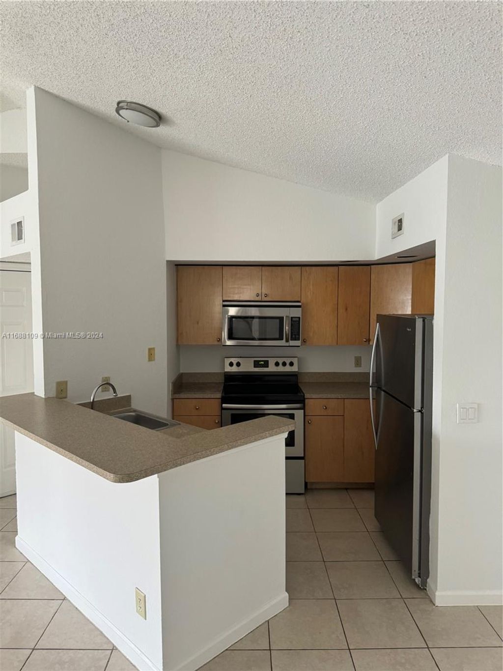 Photo of 12620 Vista Isles Dr #1022, Sunrise, FL 33325 (MLS # A11688109)
