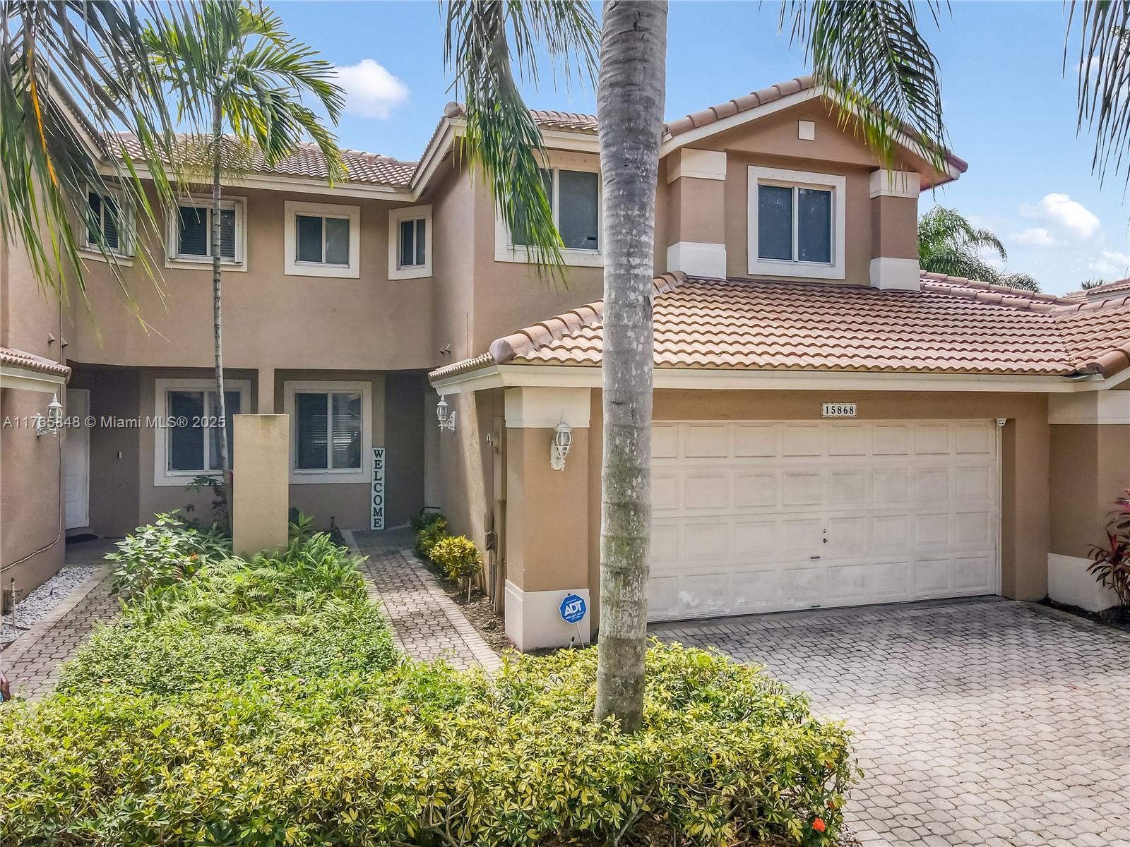 *SEE ATTACHED FLYER FOR MORTGAGE RATE BUYDOWN OPTIONS!* Discover waterfront living in this beautifully updated 2-story home in Grand Palms Golf Community! Nestled along a peaceful canal, this 3/2.5 gem features a NEW ROOF installed in 2022 boasting an open floor plan w/ soaring vaulted ceilings & stylish laminate flooring throughout. The spacious living/dining areas flow seamlessly to the outdoor patio, perfect for entertaining or relaxing by the water. Upstairs, you’ll find all 3 bedrooms, including a serene primary suite w/ private bath. Enjoy the convenience of an air-conditioned laundry area just off of the 2-car garage on the 1st floor. Modern updates, storm shutters, & prime location, this home is a must-see!