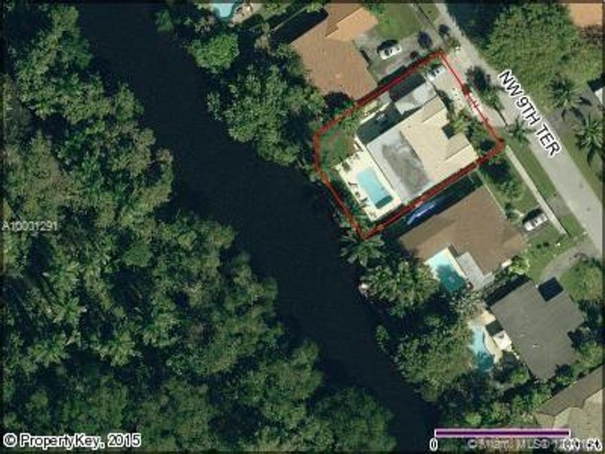 Ocean access for smaller boats..4 bed/2 bath ..just completed renovations ( over $130k) ..Bamboo and Porcelain floors.. impact windows and doors.. new "S" tile roof (2013),new plumbing & electrical....paver circle drive.. garage, open pool, large fenced back yard...great view  overlooking the waterway (80'-100' wide) ..additional upgrades..(Samsung side/side Stainless  Refrigerator, Corinthian tile bathroom, Samsung 50" TV, BBQ, Marble patio table set, spa)