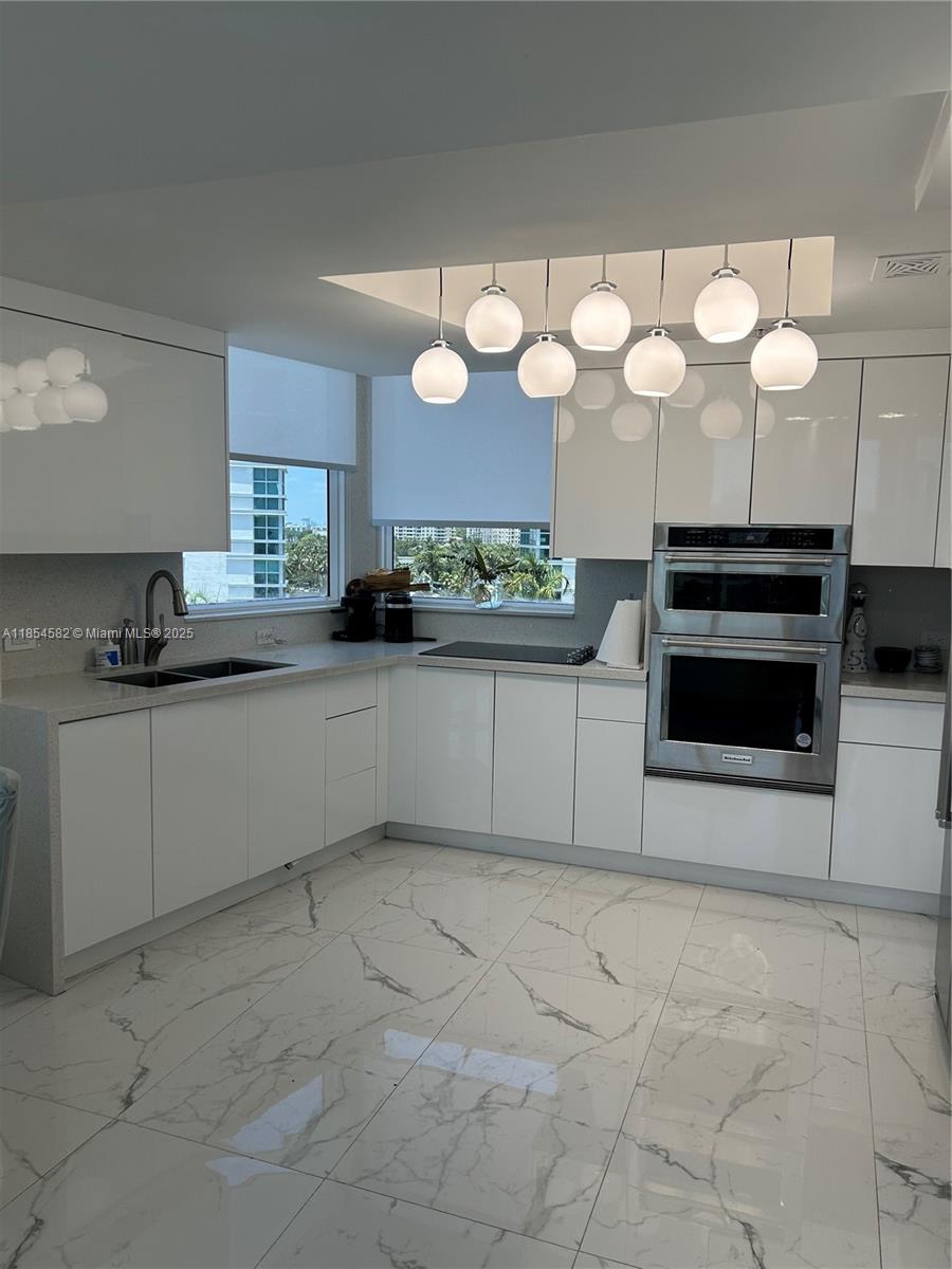 Eastside boutique style building in the heart of Aventura. Beautifully renovated penthouse two story unit was originally a four bedroom converted to a 3/2.5 with porcelain floors throughout, sleek open kitchen with quartz counter tops and newer stainless steel appliances, lots of light with windows in just about every room, custom closets, updated bathrooms, your own private balcony from the master. Unit offers intracoastal and pool views. Also comes with two parking spaces. Amenities include fitness center, pool, and clubhouse. Unit can be rented furnished or unfurnished the owner is flexible. The area is very peaceful and safe, conveniently located near shops, restaurants, grade A charter school, parks, Aventura mall, and a 10 min drive to beaches.