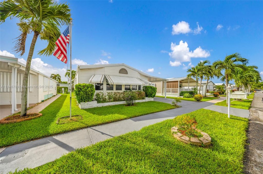 Photo of 5298 NW 4th Ter, Deerfield Beach, FL 33064 (MLS # A11846789)