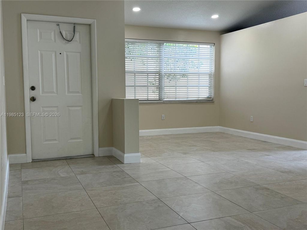 Photo of 15686 NW 12th Mnr #15686, Pembroke Pines, FL 33028 (MLS # A11985123)