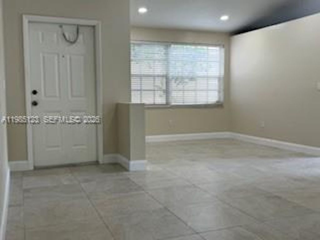Photo of 15686 NW 12th Mnr #15686, Pembroke Pines, FL 33028 (MLS # A11985123)