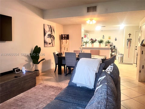 Photo of 1210 Sorrento Dr, Weston, FL 33326 (MLS # A12065554)