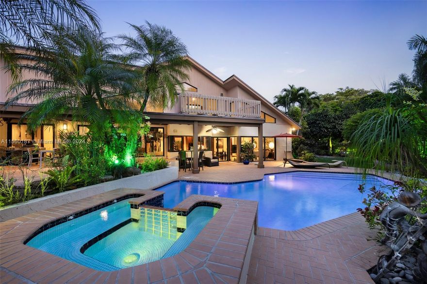 Family pool home on 33,977 sf lot with stunning tropical landscaping. Post modern style characterized by repeated geometric shapes, sustainable natural elements, and large expansive windows, creating visually open and stunning sanctuaries. Split plan 5BD, 4bathrooms, den/family room, maid’s quarters, 2 car garage, and a detached permitted air-conditioned office. Large private primary suite with its own den, roof deck, and a spacious en suite bathroom. Newly resurfaced pool and Jacuzzi surrounded by covered brick patio, and sunning area, perfect for lazy days at home, or indoor/outdoor entertainment. Impact windows throughout, original custom wood millwork, marble floors, and finishes. This home has been meticulously maintained over the years by only one owner.