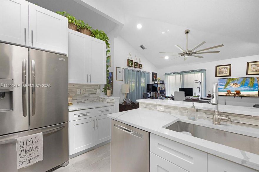 Coral Springs Stunner!~Guard Gated*Turnkey 3-Bed/3-Bath home in Eagle Trace’s Georgetown~Completely remodeled with all-impact windows & doors, large porcelain tile throughout & a bright open split floor plan w/2 skylights~Stunning kitchen w/Quartz countertops & SS appliances~The primary suite offers 2-walk-in closets and a spa-style bath w/freestanding soaking tub & separate shower~All bathrooms have aesthetically appealing decor & quartz countertops~*1-guest suite includes a private bath~Featuring an EV charging station, low HOA dues, & access to the Eagle Trace clubhouse w/Golf & resort-style amenities*Plus Architectural plans for an extended screened patio and added pool are included~Great schools and convenient location!! Prime Golf Community!!