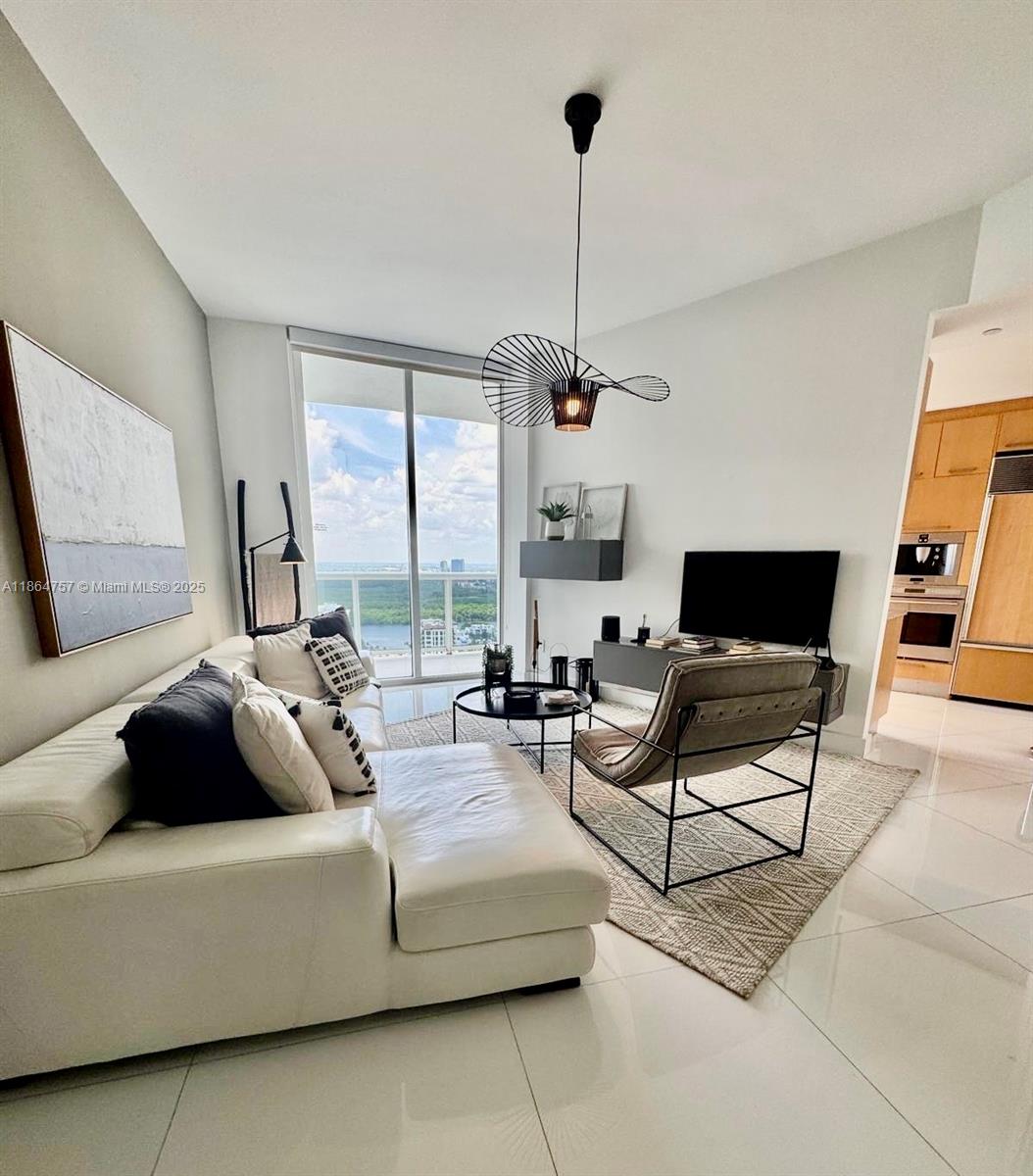 Experience luxury living in this stunning seasonal rental at the prestigious Trump Tower II/2. This beautifully furnished 2-bedroom, 2-bathroom unit offers breathtaking Intracoastal water views and an elegant, modern design. Enjoy five-star amenities, including a state-of-the-art fitness center, rejuvenating spa, beachfront restaurant, and exclusive beach service. Nestled in an oceanfront condominium, this residence offers a resort-style living at its finest. Close to everything. Seasonal rental.
