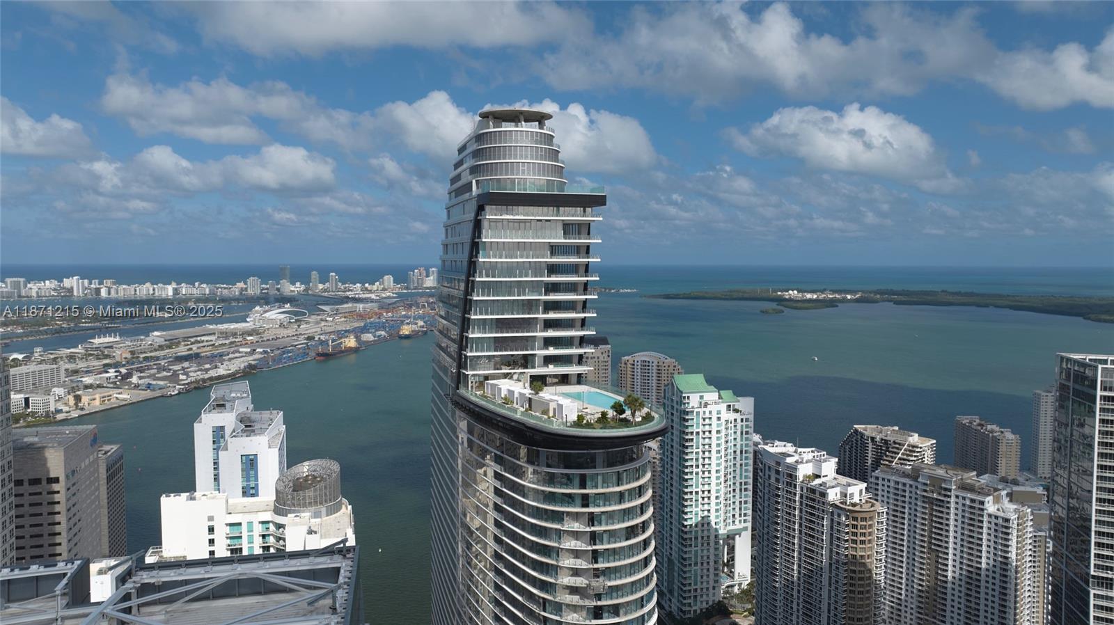 Largest Split Floor plan, Fully Furnished 2 bedrooms + DEN, 3 full bathrooms condo at Aston Martin Residences with direct Miami River views. Located on the 5th floor, this 1675 sq ft unit boasts one of the largest living rooms available for 2 bedrroms type (18'x31'). Motorized shares and sensor montion in closet lighting. Exclusive floor plan, with 9 limited residences like this one. This residence includes 1 assigned parking space on same floor and top-tier finishes throughout. The building offers over 42,000 sq ft of world-class amenities, including a swimming pool on the 55th floor, a state of the art gym, spa, art gallery, 2 Movie theathers, golf practice area, grand community room, Kids room, Aston Martin DBX house Car, valet parking, and concierge services.