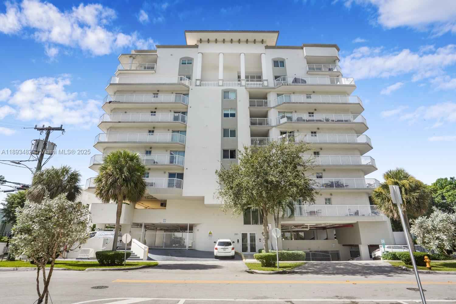 Enjoy breathtaking views from this beautifully updated 2-bed/2-bath penthouse residence in a boutique building nestled in The Roads. This rare two-story unit features two expansive balconies—one on each level—perfect for watching the sunset or entertaining guests. The secure building offers a renovated fitness center, large shared terrace for gatherings, & assigned parking space. Inside, the unit showcases elegant marble floors throughout, a modern updated kitchen with full appliances, & two completely renovated bathrooms. Additional features include modern lighting, new doors, ample storage, & an in-unit washer/dryer. Ideal for those who work from home or commute, the location offers quick access to Brickell, Coral Gables, Key Biscayne, & Coconut Grove. A Must See! Easy to show.