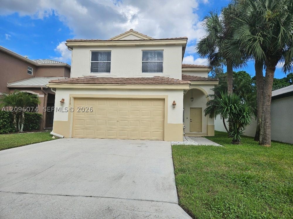 Photo of 7604 Sierra Ridge Ln, Lake Worth, FL 33463 (MLS # A12096074)
