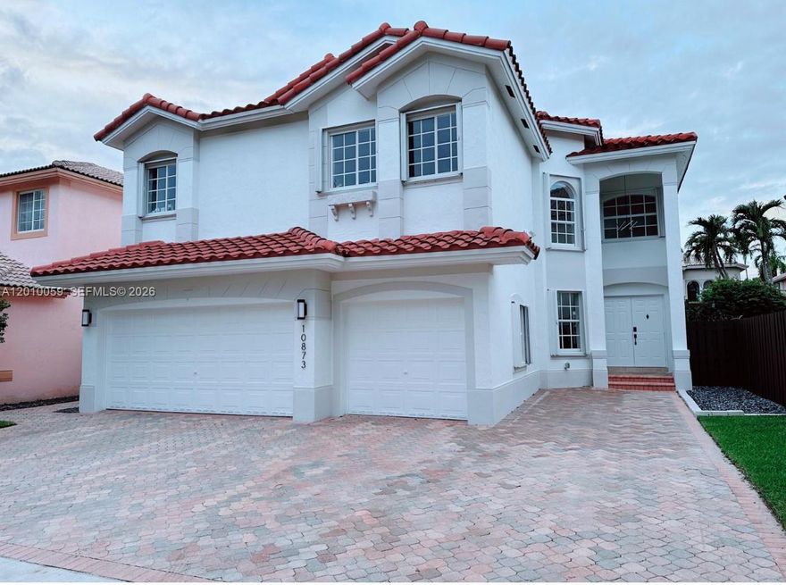 Discover this beautiful 5-bedroom 3-bathroom home in the exclusive Doral Isles St Croix community, three-car garage inside, hurricane shutters