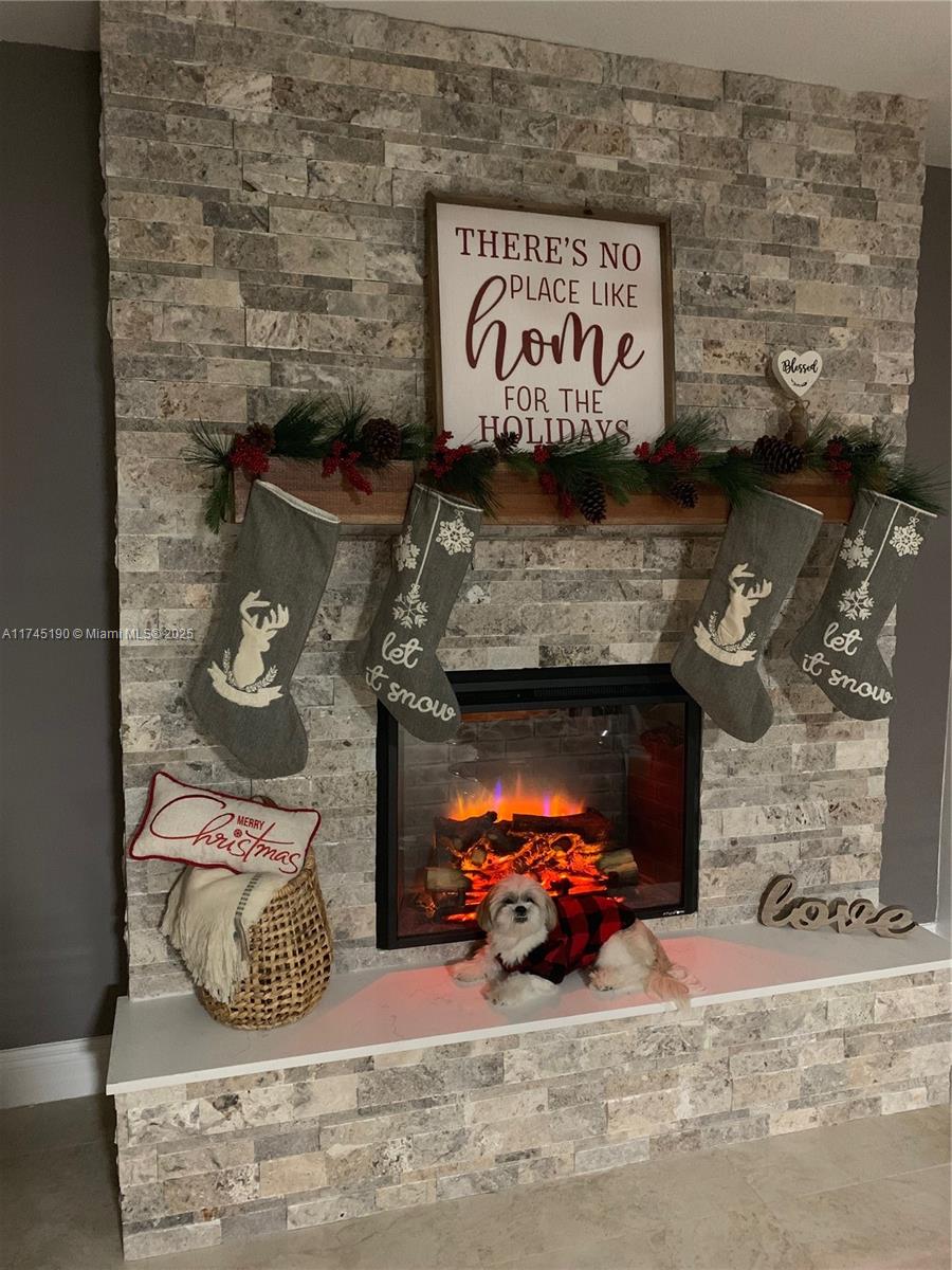 This beautifully upgraded home, front impact windows, and modern lighting, The renovated kitchen and updated bathrooms , Terrace with the covered aluminum patio provides the perfect space for outdoor entertaining.. This move-in ready gem is waiting for you to make it your own!. Any question call the listing agent.