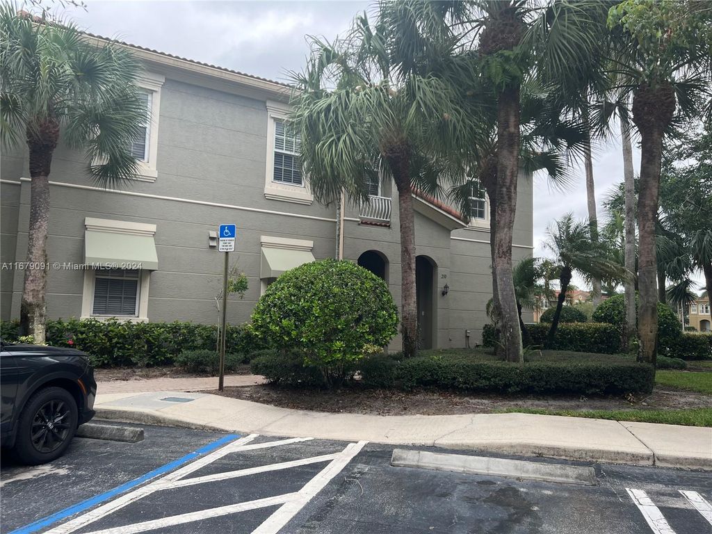 Photo of 4966 Bonsai Cir #110, Palm Beach Gardens, FL 33418 (MLS # A11679091)