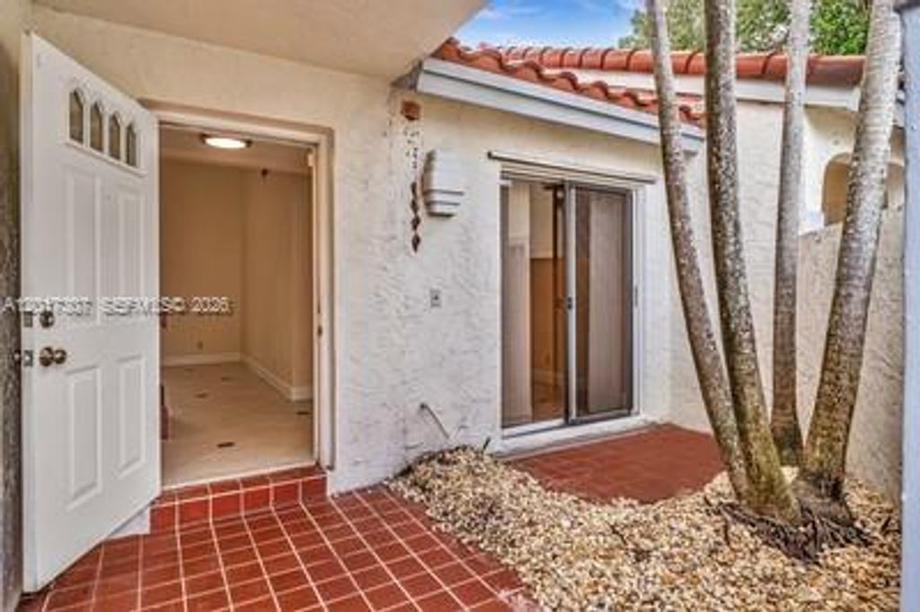 Photo of 1395 Cottonwood Cir #1395, Weston, FL 33326 (MLS # A12017307)