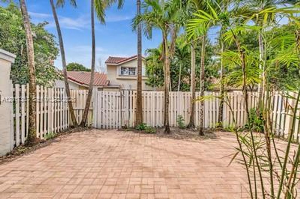 Photo of 1395 Cottonwood Cir #1395, Weston, FL 33326 (MLS # A12017307)