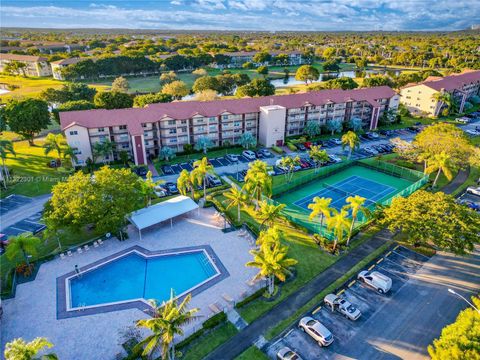 Photo of 100 SW 130th Ter #202C, Pembroke Pines, FL 33027 (MLS # A11322301)