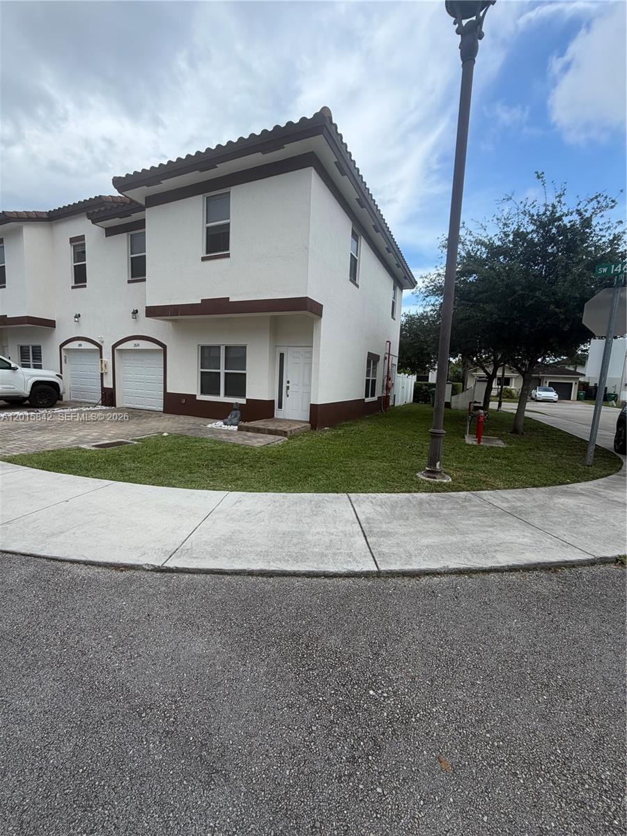 MILLENNIUM TOWNHOMES COND - Residential