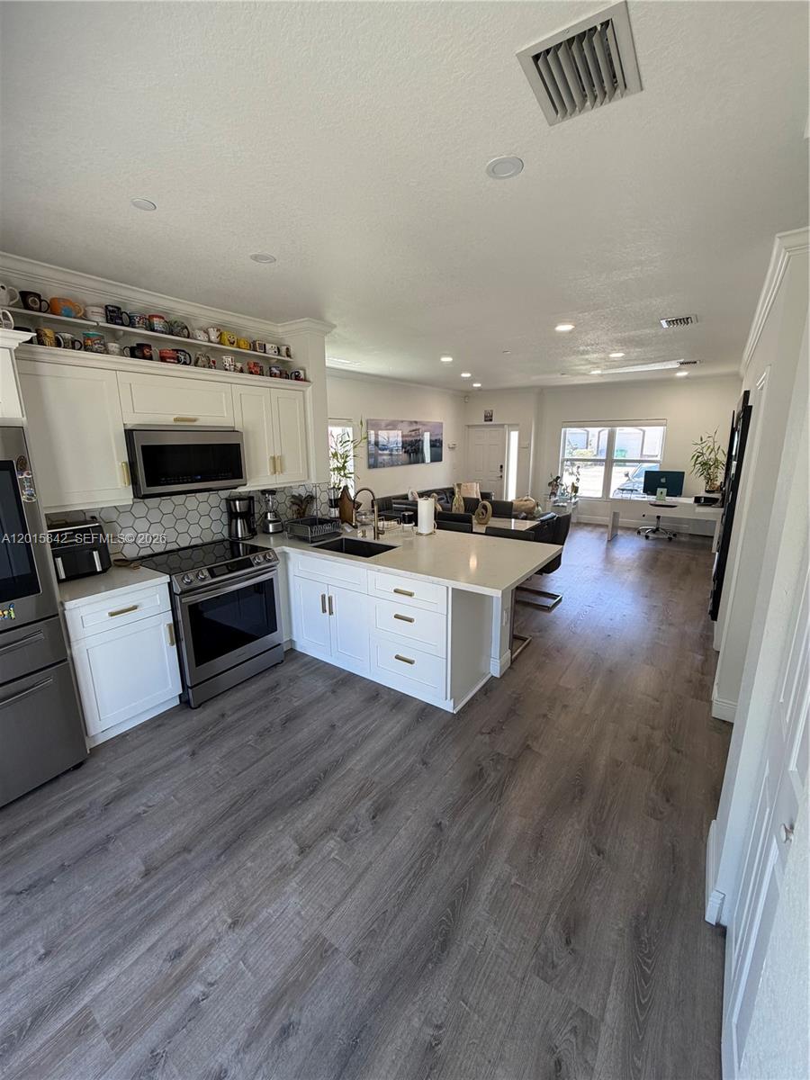 MILLENNIUM TOWNHOMES COND - Residential