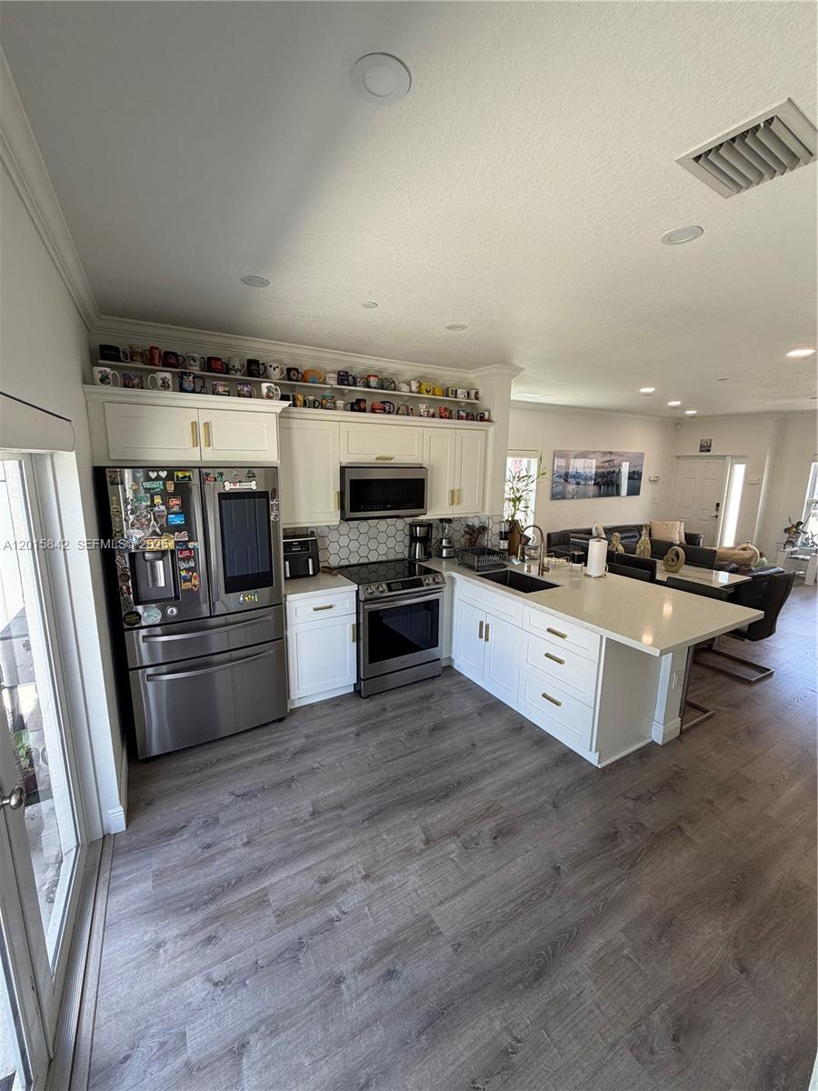 MILLENNIUM TOWNHOMES COND - Residential