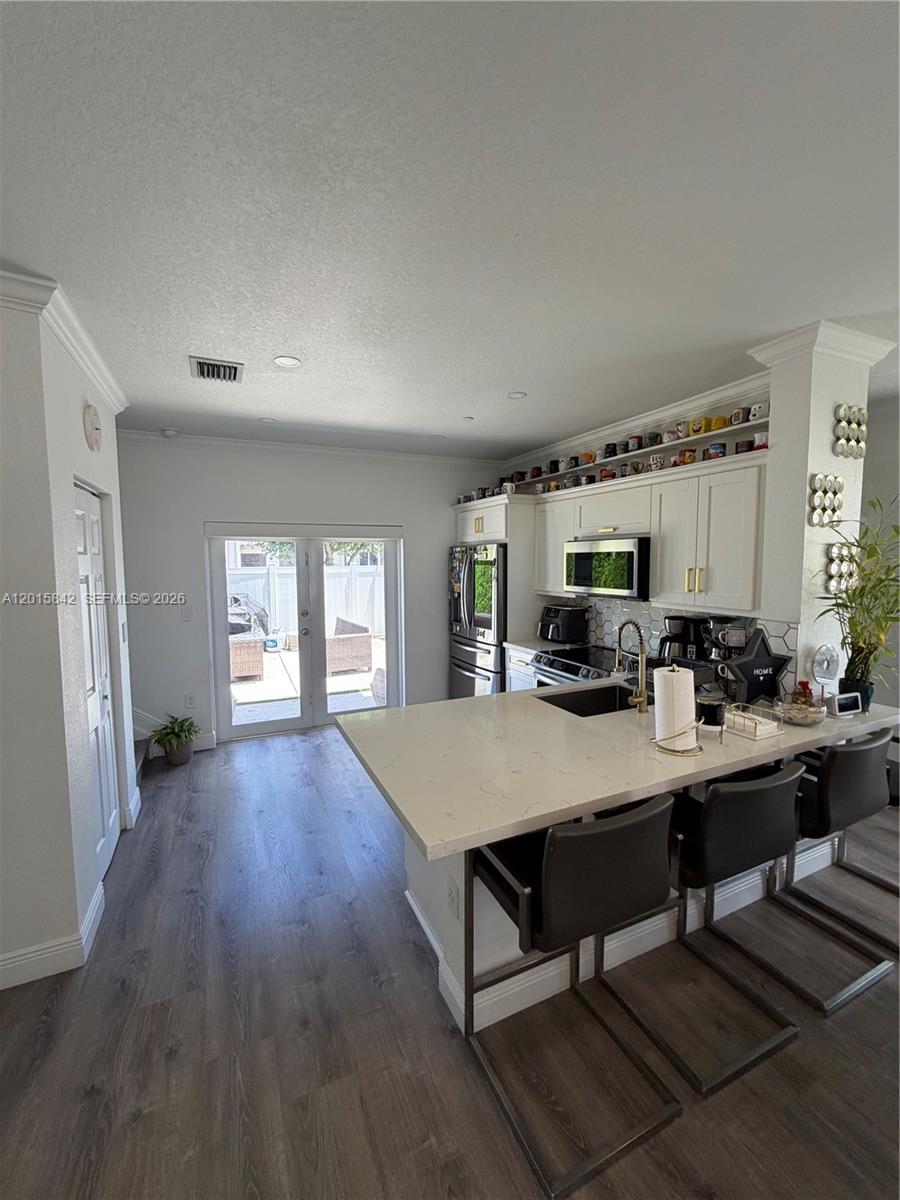 MILLENNIUM TOWNHOMES COND - Residential