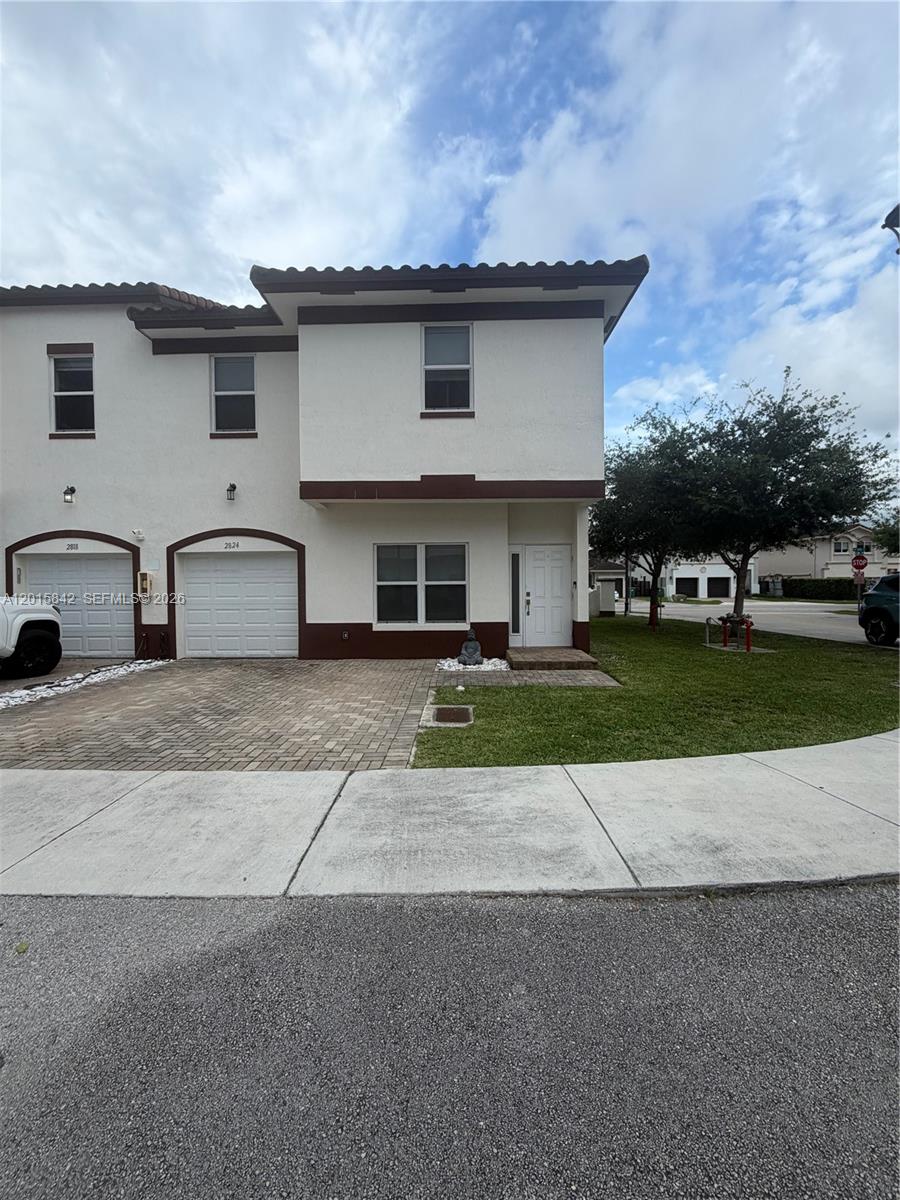 MILLENNIUM TOWNHOMES COND - Residential