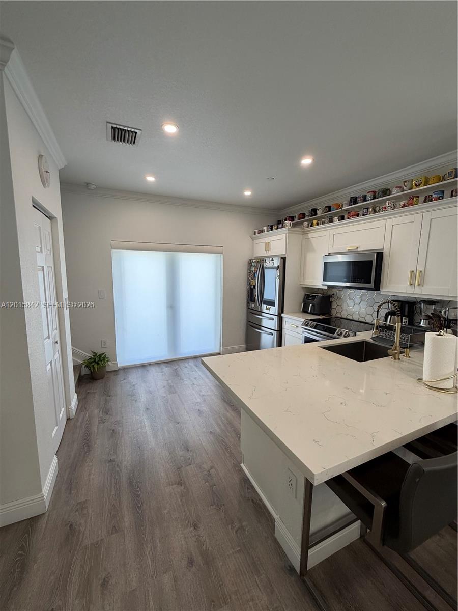 MILLENNIUM TOWNHOMES COND - Residential