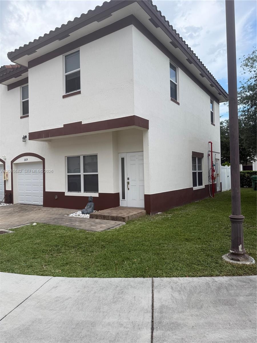 MILLENNIUM TOWNHOMES COND - Residential