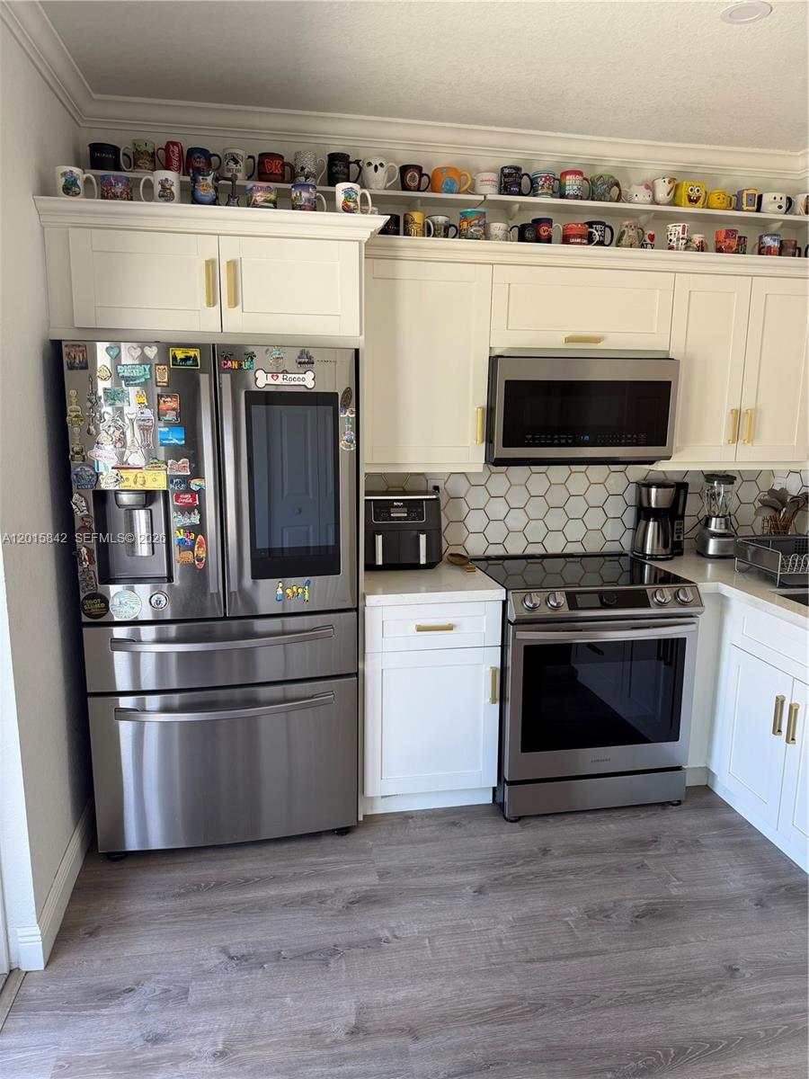 MILLENNIUM TOWNHOMES COND - Residential