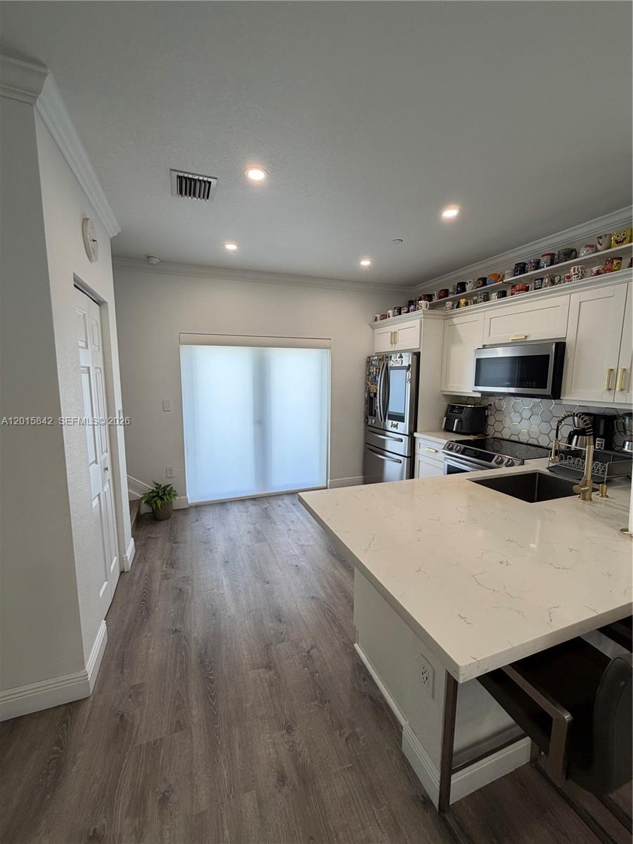MILLENNIUM TOWNHOMES COND - Residential