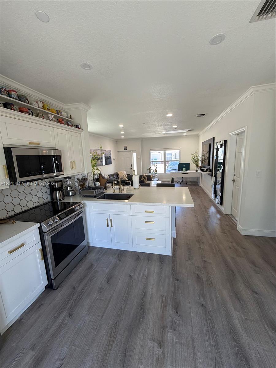 MILLENNIUM TOWNHOMES COND - Residential