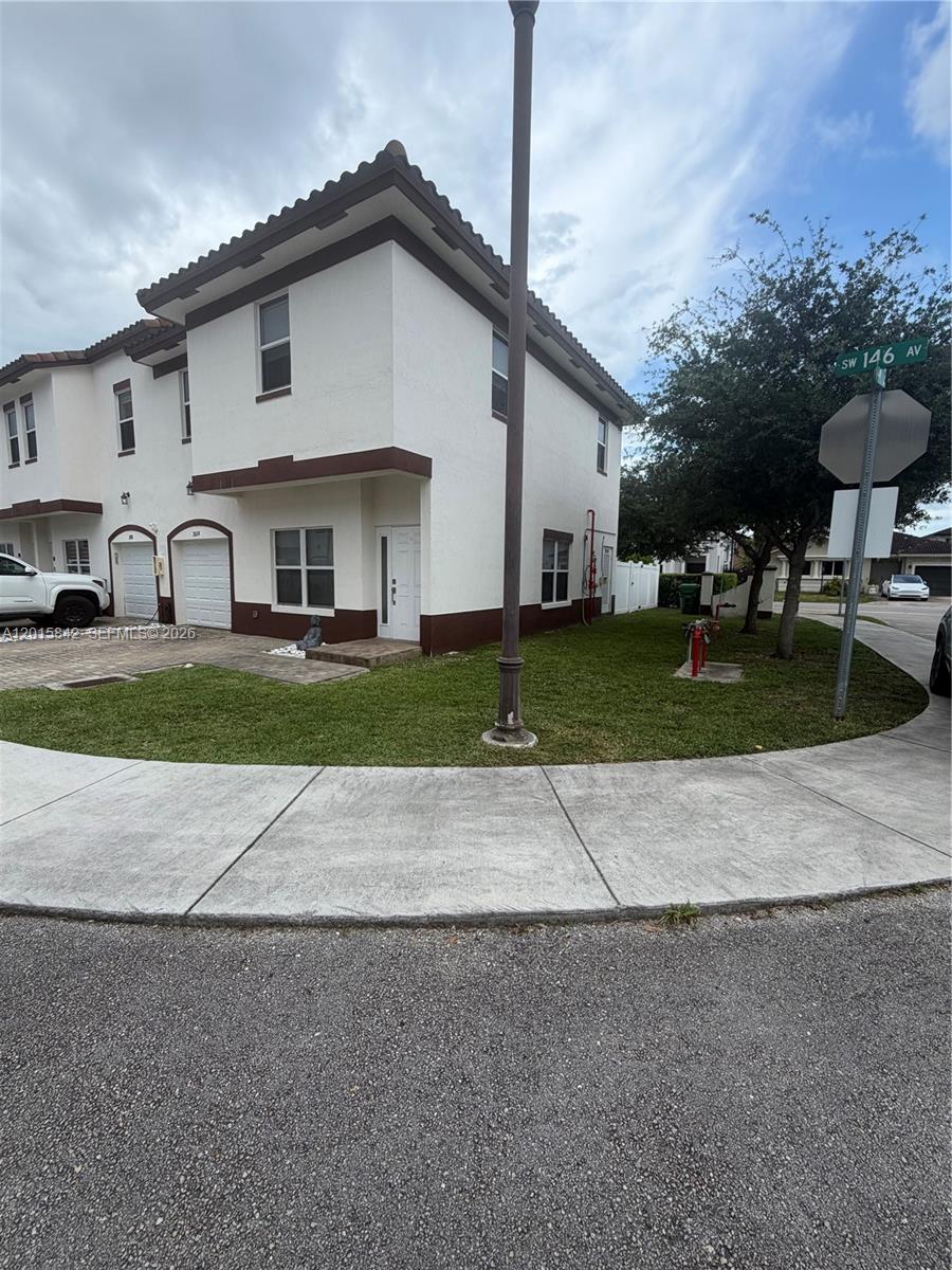 MILLENNIUM TOWNHOMES COND - Residential