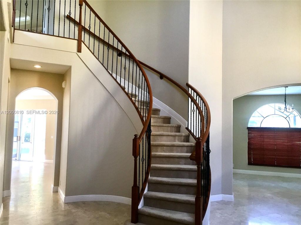 Photo of 7477 NW 114th Ter #7477, Parkland, FL 33076 (MLS # A12000810)