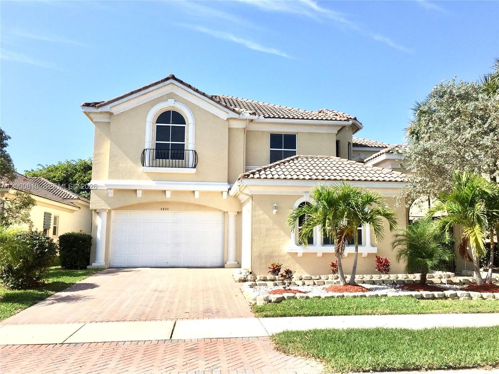 Photo of 7477 NW 114th Ter #7477, Parkland, FL 33076 (MLS # A12000810)