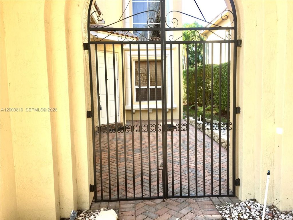 Photo of 7477 NW 114th Ter #7477, Parkland, FL 33076 (MLS # A12000810)