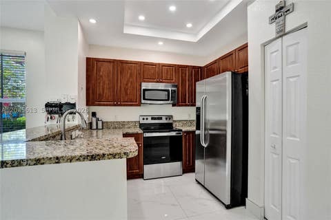 Tiny photo for 4760 Mimosa Pl #1001, Coconut Creek, FL 33073 (MLS # A12045613)