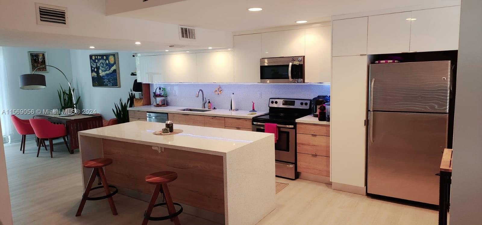 Gorgeous remodeled two story 2 bedroom 2.5 bath at NorthGate Townhomes. Newer modern finishes, balcony with lush garden view, enormous private patio space, ample closets, washer / dryer, parking. Both bedrooms with ensuite baths. Gated community with pool. Ideal location east of Biscayne Blvd, close to restaurants, shopping, entertainment, and a short drive to downtown, I95, or the beaches. *Can be rented furnished OR unfurnished.