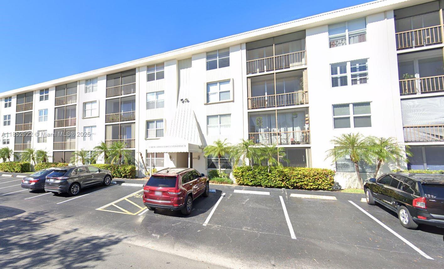 Coral Ridge East Condominium is nestled in a prestigous residential community steps from the Coral Ridge Country Club, just east of US1 and a few blocks from Commercial Blvd. This fantastic location is less than 10 mins away from the beach and has plenty of shopping, restaurants and entertainment nearby. Great public and private schools close by and easy access to public transportation. This 1st floor unit features a screened balcony, central AC, ceiling fans, walk in closets, assigned private parking and spacious bedrooms. The building has a pool, laundry rooms, BBQs, guest parking and on site management. Easy to show.