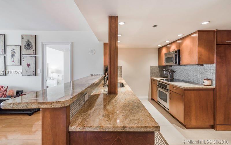 Spacious 3 bed/2bath condo with a fantastic view of Downtown Miami & Biscayne Bay. This unit has been fully remodeled with over $100K of improvements. The Grand is full service building with 24 hr security, 5 minutes to South Beach, 7 minutes to Airport, 2 blocks away from Performing Arts Center and 5 blocks away from American Airline Arena & Bayside. No pets. Washer/dryer in unit. Wooden floors throughout. Vacant and easy to show. Short term available. Negotiable. Unfurnished.