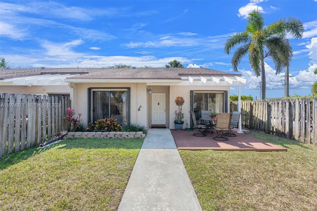 Photo of 1064 E Lakes Dr, Deerfield Beach, FL 33064 (MLS # A11974371)