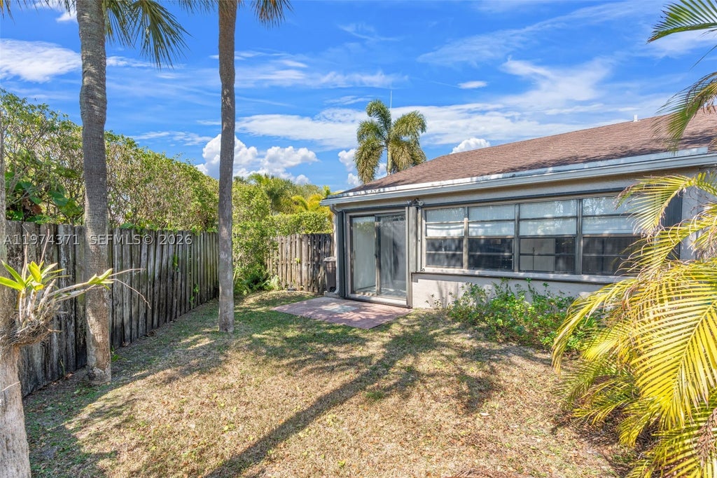 Photo of 1064 E Lakes Dr, Deerfield Beach, FL 33064 (MLS # A11974371)