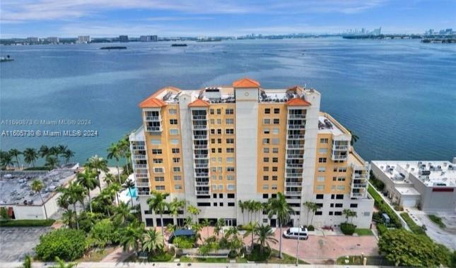 Gorgeous 2 Bedroom/2 Bathroom Condo in North Bay Village! This Spectacular Condo was completely remodeled and features marble floors through out. Updated Kitchen w/ Granite Countertops and S/S appliances perfect for entertaining. Washer/Dryer in unit and walk in closets. Remodeled bathrooms. Corner Unit Has Breath-Taking Views of Downtown Miami and Biscayne Bay! Condo building features great amenities- party room, gym, BBQ area, pool-patio overlooking the bay-inter-coastal waterway. Very Well Maintained Building. Centrally Located With Easy Access to all the major Roadways, Beaches, Shopping, Schools, Restaurants, Nightlife and So Much More! Don't Miss This Hidden Gem! 2 covered Parking Spaces! All furniture is included in the price except all the paintings.