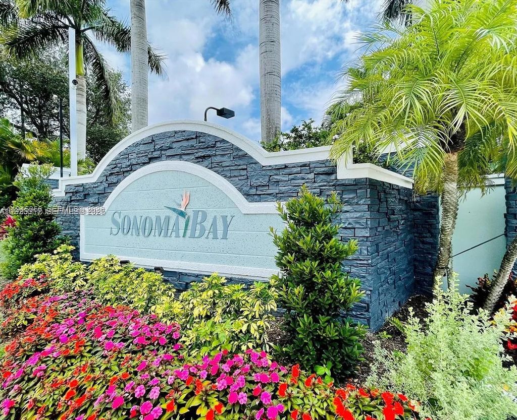 Photo of 1916 Alamanda Way, Riviera Beach, FL 33404 (MLS # A11945356)