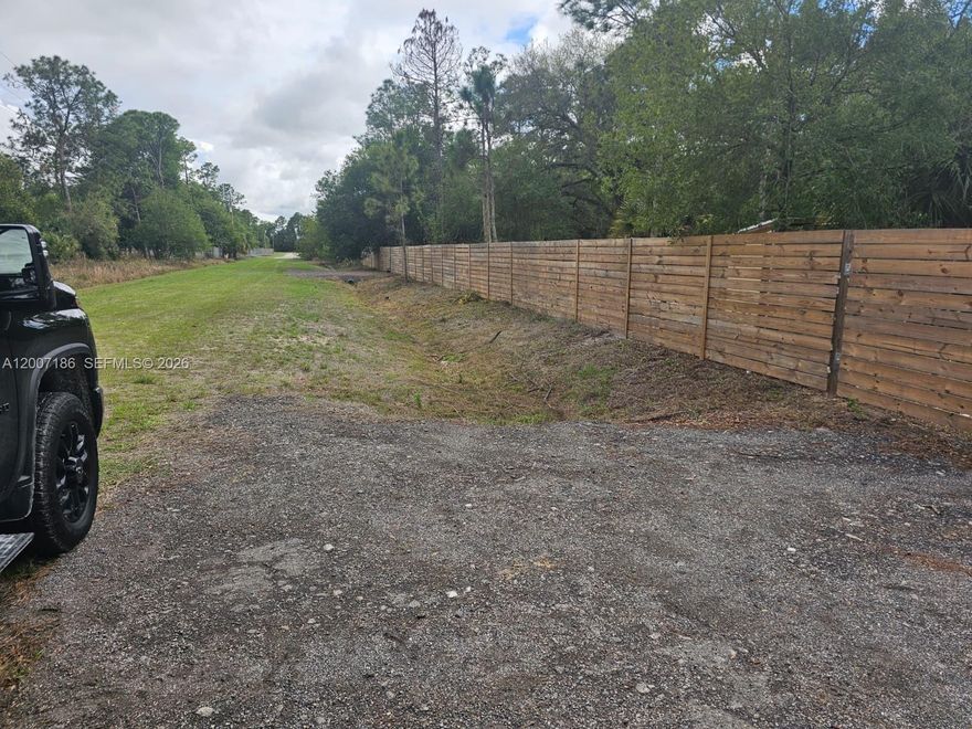 Rare opportunity to own TWO side-by-side lots in Montura Ranch Estates, offering added space, flexibility, and immediate usability. Both properties are partially fenced, featuring a beautifully finished wooden front fence that creates a charming ranch-style setting.
The property is already equipped with a working water well, protected by a small structure, along with installed driveway entrances (culverts) completed in accordance with county requirements—saving you time and upfront costs.
Additional improvements include a storage shed and an outdoor kitchen area, making it ideal for RV use, weekend getaways, or enjoying the property right away while planning your future build. Solar lights have been installed throughout the property, enhancing both ambiance and functionality.
Per the available survey, the lots are not identified as wetlands, offering excellent usability and making future development more straightforward. This is a great opportunity to build, invest, or create your own private rural retreat.
