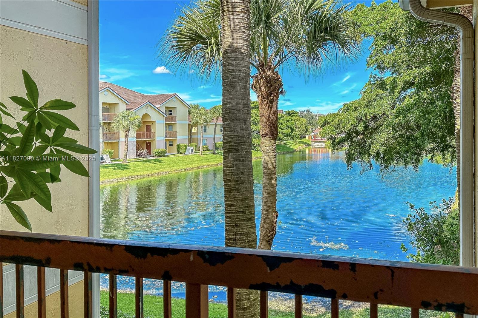 Best prices unit in complex Community is undergoing Complete Makeover! New modern metal roof and all facade and painting is well underway throughout! Amazing beauty unique First floor access to a three bedroom with a picture postcard view of the lake, with two full bathrooms. Beautifull foliage surrounds the entrance and front exposure with stunning lake views. Community of South Palm place is centrally located area of Tamarac. Unit comes with two deeded parking spaces steps from the home. Amenities: beautiful pool, sun deck, tennis courts, clubhouse with full fitness center. Minutes from Super Walmart sytore as well as restaurants and other shopping and services.