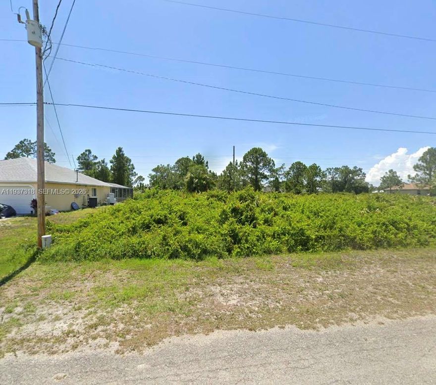 Build your Dream Home on this 0.23-acre residential lot located in the growing community of Lehigh Acres, Lee County.  
This desirable property features a paved road, electricity to site, and is surrounded by new and existing homes, making it an ideal setting for new construction.   
Enjoy nearby amenities, and breathtaking sunsets at Fort Myers Beach.  Conveniently located near Publix, local schools, and retail centers, with easy access to Bell Blvd and State Road 82 for commuting throughout Lehigh Acres and Fort Myers.   
A great opportunity to design and build a New Home in an established neighborhood with ongoing development!